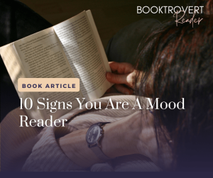 Person reading a book while lounging, their wrist adorned with a watch, embodying the relaxed vibe of '10 Signs You Are a Mood Reader.