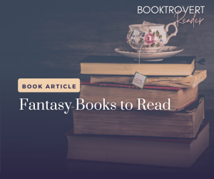 Stack of hardcover books with a floral teacup and saucer on top, featuring a tea bag tag, representing a cozy theme for the 'Fantasy Books to Read' article."