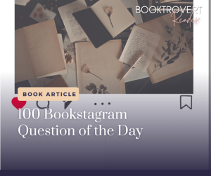 Graphic promoting a book article titled '100 Bookstagram Question of the Day.' The image features an arrangement of open notebooks with handwritten notes and pressed flowers scattered on a table. The overlay text includes the article title in large, elegant font, with the label 'Book Article' above it. The 'Booktrovert Reader' branding is visible in the top right corner, and social media icons, including a heart and a bookmark, are subtly incorporated into the design.